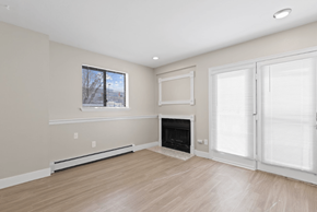 Boulder apartment for rent - A room with a fireplace and a window.