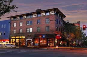 Denver apartment for rent - a large brick building with a traffic light in front of it