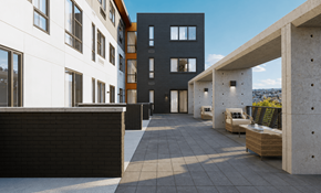 Lakewood apartment for rent - A modern building with a concrete structure and a black wall.