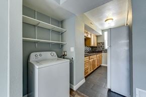 Lafayette townhouse for rent - a kitchen and laundry room with a washer and dryer