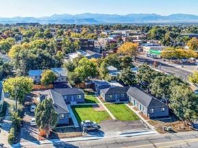 Wheat Ridge apartment for rent - A suburban neighborhood with houses and trees.
