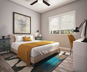 Boulder triplex for rent - a bedroom with a white bed and a yellow blanket