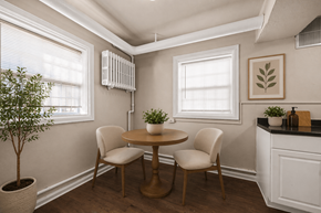 Denver apartment for rent - A small dining room with a table and chairs.