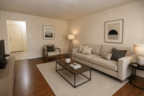 Aurora apartment for rent - A living room with a couch, chair, and coffee table.