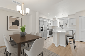 Parker townhouse for rent - Modern dining room with a wooden table and white chairs at The Townhomes at Pine Drive, Parker, CO, 80138
