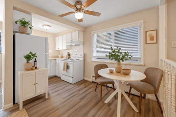 Denver apartment for rent - A kitchen with a table and chairs.