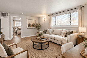 Denver apartment for rent - A living room with a couch, chair, and coffee table.