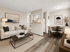Denver apartment for rent - A modern living room with a white sofa, a coffee table, and a dining table.