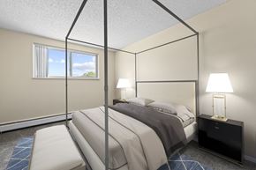 Commerce City apartment for rent - A bedroom with a four poster bed and a window.