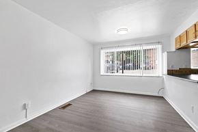 Boulder apartment for rent - an empty living room with a large window