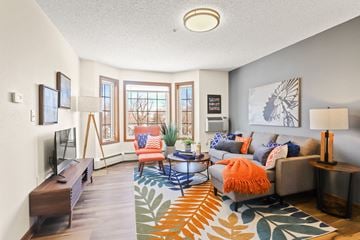 Greeley apartment for rent - the living room of an apartment with a couch and a tv