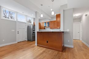 Boulder apartment for rent - A kitchen with wooden cabinets and a refrigerator.