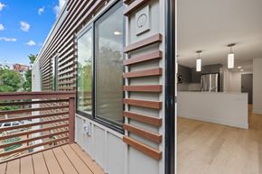 Boulder apartment for rent - a small house with a window and a clock on the wall