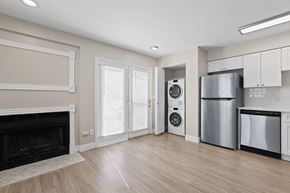 Boulder apartment for rent - Living room with a fireplace and easy kitchen access