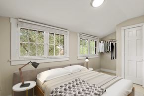 Boulder triplex for rent - A bedroom with a large bed and a window with blinds.