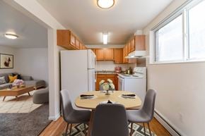 Lakewood apartment for rent - A dining room with a table set for two.