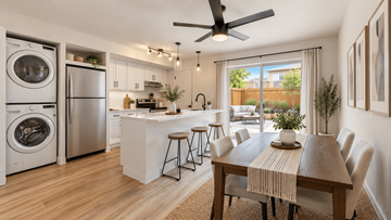 Littleton apartment for rent - A modern kitchen with a dining table set for six.