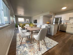 Boulder triplex for rent - A dining room with a table and chairs.