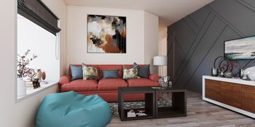 Boulder apartment for rent - A living room with a red couch and a large abstract painting on the wall.