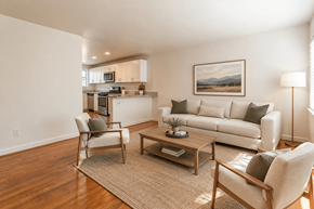 Wheat Ridge apartment for rent - A living room with a couch, chair, and coffee table.