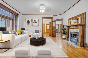 Boulder apartment for rent - A living room with a fireplace and a white couch.