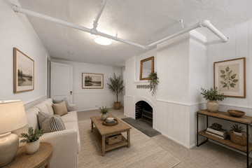 Denver townhouse for rent - A cozy living room with a fireplace and a couch.