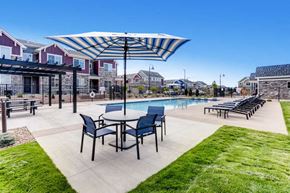 Aurora townhouse for rent - Sparkling Swimming Pool with seating area at The Point at Biscay, Aurora, CO, 80013