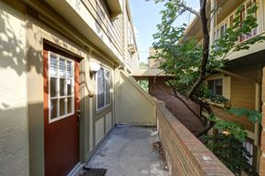 Boulder apartment for rent - the front door of a house with a walkway next to it