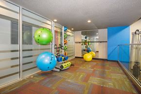 Denver apartment for rent - a gym with a bunch of balls and other exercise equipment