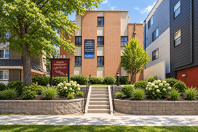 Denver apartment for rent - A building with a sign that says South University on it.