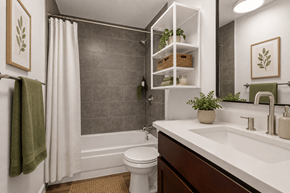 Boulder apartment for rent - A bathroom with a white toilet, a white sink, and a white shower curtain.
