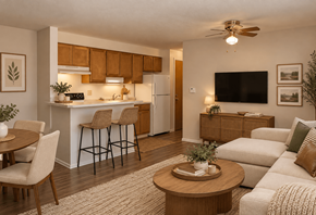 Denver apartment for rent - A living room with a couch, chairs, and a television.