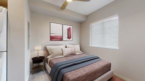 Denver apartment for rent - a bedroom with a bed and a window