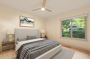 Boulder apartment for rent - a bedroom with a bed and a large window