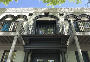 Denver apartment for rent - a tall building with a balcony and a window