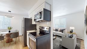 Arvada apartment for rent - A modern kitchen with a black fridge and stove.