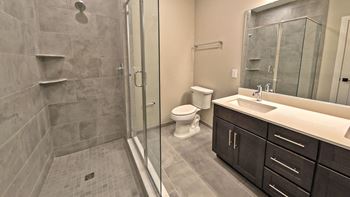 Porcelain tile flooring in bathrooms