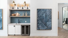 Whitehouse Station apartment for rent - a kitchen with white cabinets and a sink and a blue wall