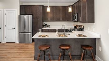 Solid wood shaker style cabinets in kitchen