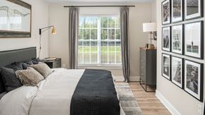Whitehouse Station apartment for rent - a bedroom with a large bed and a window