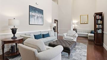 Whitehall apartment for rent - A living room with a grey couch and a black ottoman.