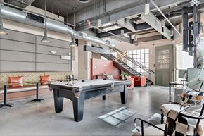 Winston-Salem apartment for rent - a pool table in an open room in a loft