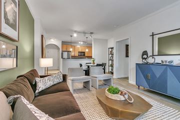 Atlanta apartment for rent - a living room with a couch and a table
