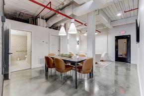 Marietta apartment for rent - a dining area with a long table and chairs
