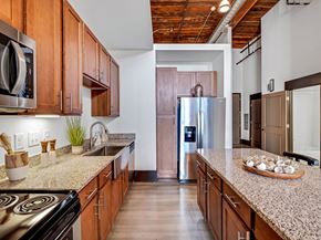 Gastonia apartment for rent - a kitchen with granite counter tops and stainless steel appliances