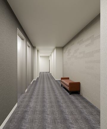 Halifax apartment for rent - A long hallway with a bench on the right side.