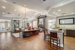 Herndon apartment for rent - a large living room with a kitchen and a dining room