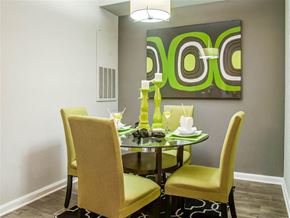 Franklin apartment for rent - Harpeth River Oaks - Separate Dining Area with Wood Style Flooring Next to Fully Equipped Kitchen