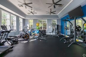 Glen Mills apartment for rent - A gym with a variety of exercise equipment including treadmills, stationary bikes, and weight machines.