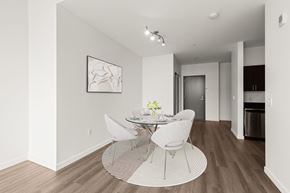 Seattle apartment for rent - A dining room with a white table and chairs.
